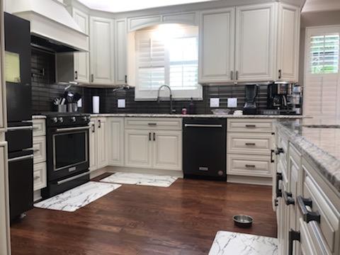 Stove dishwasher sink in kitchen