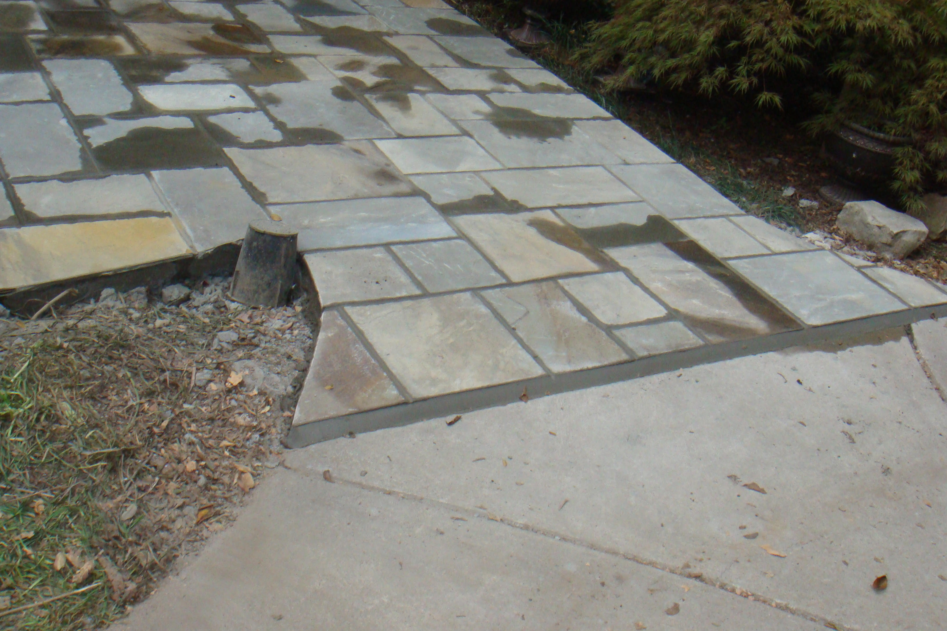 Patio power washed with new tiles