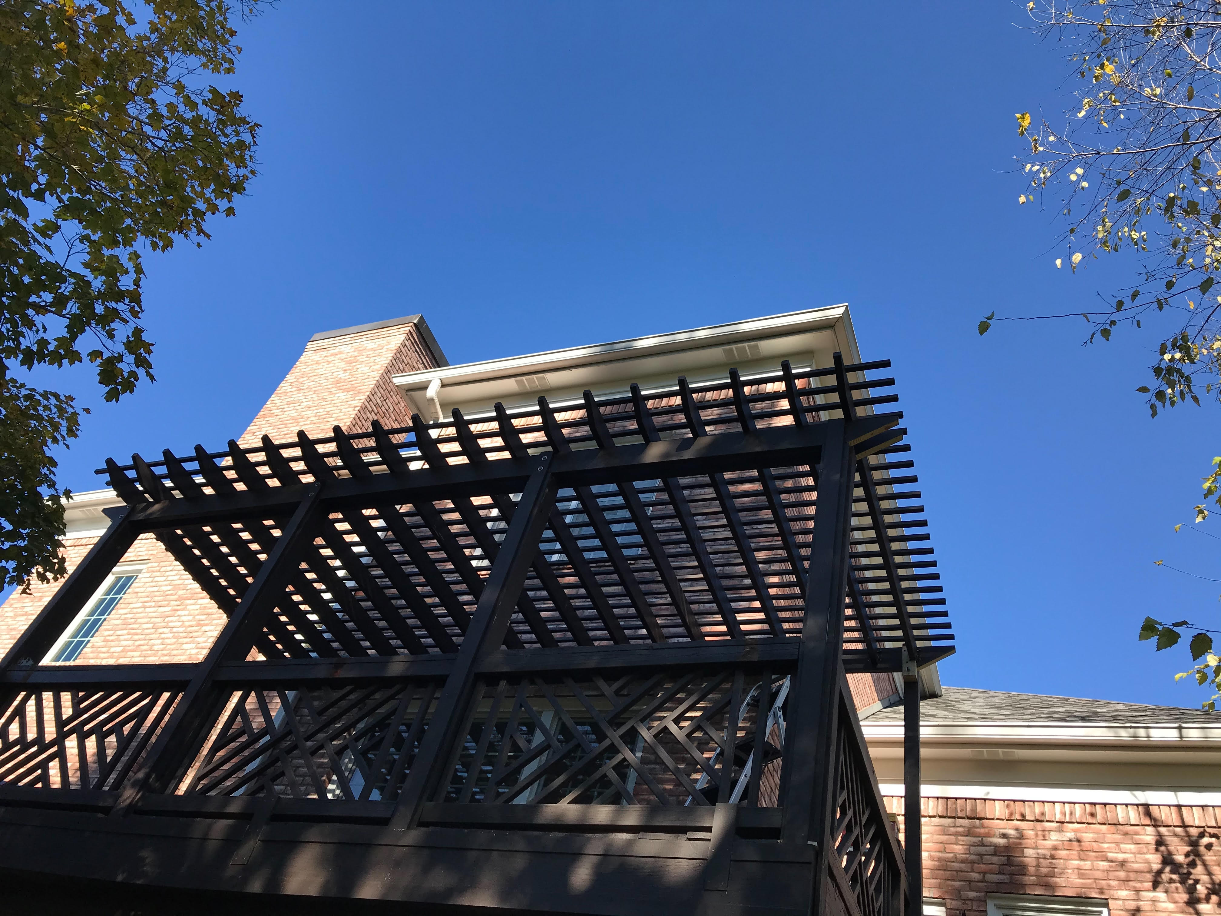 Custom made balcony with a black finished wood